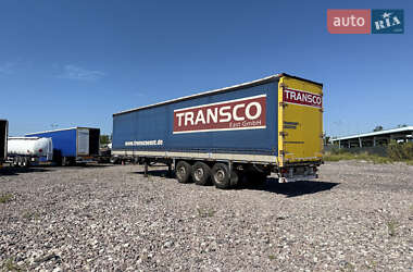 Бортовий напівпричіп Schmitz Cargobull S01 2002 в Києві