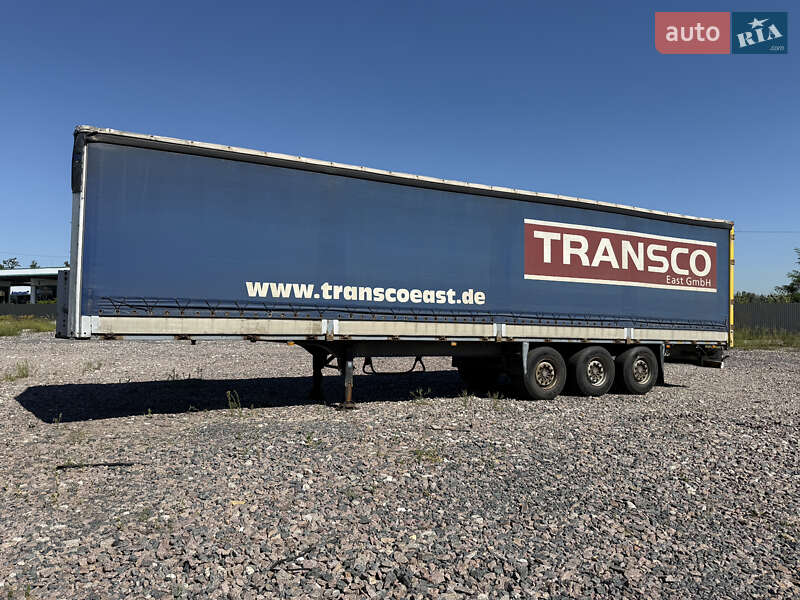 Бортовой полуприцеп Schmitz Cargobull S01 2002 в Киеве