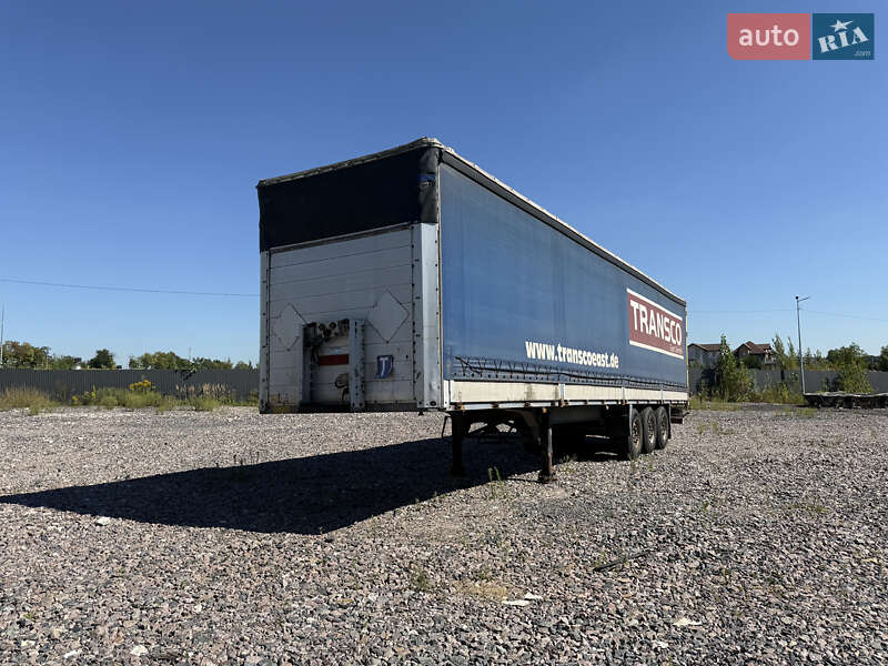 Бортовой полуприцеп Schmitz Cargobull S01 2002 в Киеве