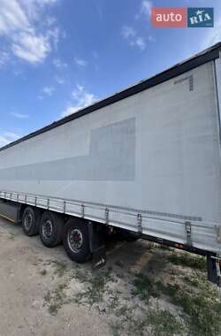 Тентований борт (штора) - напівпричіп Schmitz Cargobull SCS 2009 в 