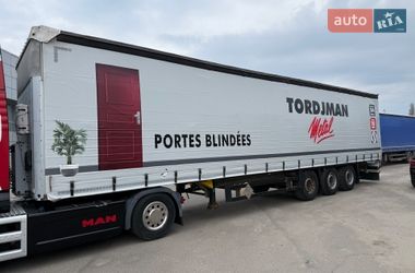 Тентований борт (штора) - напівпричіп Schmitz Cargobull SCS 2011 в Львові