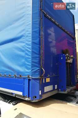 Бортовой полуприцеп Schmitz Cargobull SO1 2014 в 