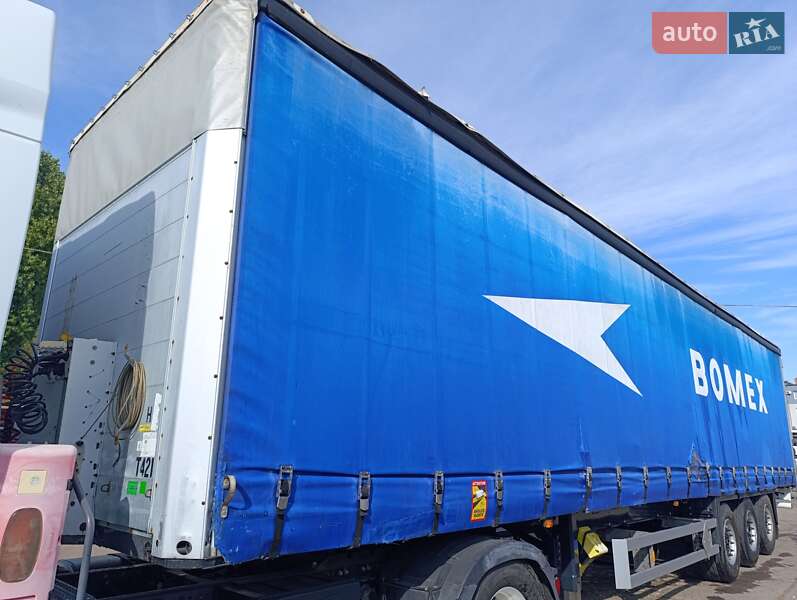 Тентованный борт (штора) - полуприцеп Schmitz Cargobull SSD 2003 в Ровно