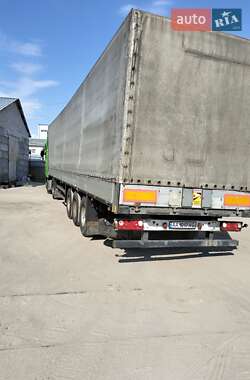Бортовой полуприцеп Schmitz S-01 2003 в 