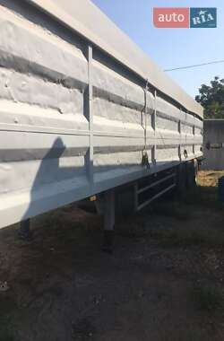 Бортовой полуприцеп Schmitz S-01 2004 в 