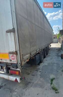 Бортовой полуприцеп Schmitz S-01 2004 в 