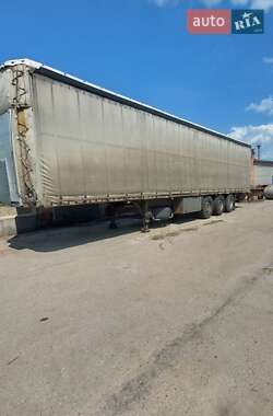 Бортовой полуприцеп Schmitz S-01 2004 в 
