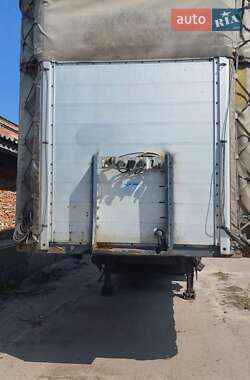 Бортовой полуприцеп Schmitz S-01 2004 в 