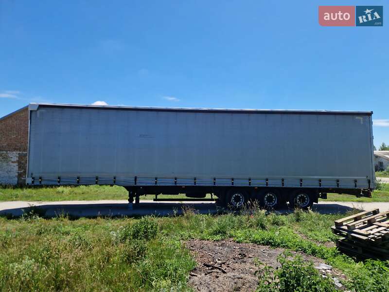 Тентованный борт (штора) - полуприцеп Schmitz S-01 2005 в Остроге фото 2 Тентованный борт (штора) - полуприцеп Schmitz S-01 2005 в Остроге