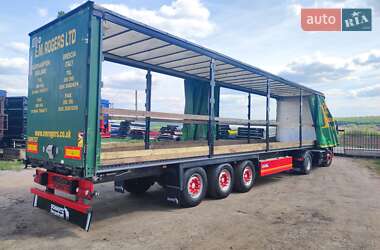 Тентований борт (штора) - напівпричіп Schmitz SCS 24 2009 в 