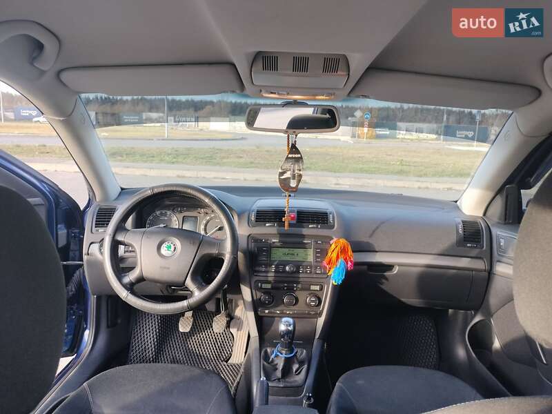 Универсал Skoda Octavia 2007 в Вишневом фото 2 Универсал Skoda Octavia 2007 в Вишневом