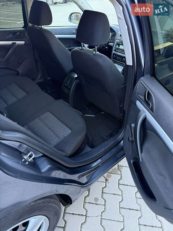 Универсал Skoda Octavia 2010 в Вишневом фото 12 Универсал Skoda Octavia 2010 в Вишневом