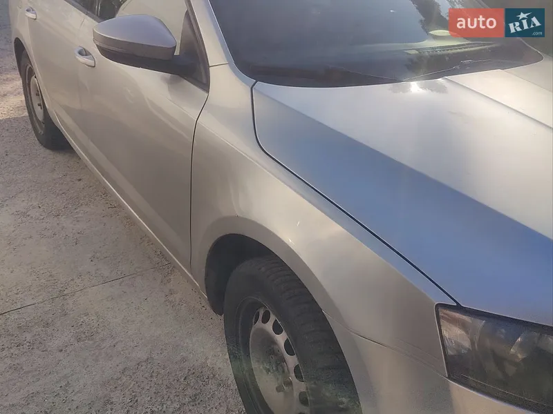 Skoda Octavia 2014 VIN TMBAJ2NE5FB006097 фото оголошення 4 з 39