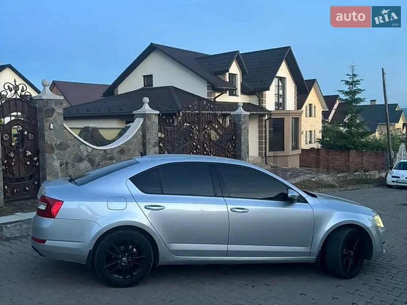 Skoda Octavia 2013 VIN TMBAJ7NE2E0068242 фото оголошення 4 з 40