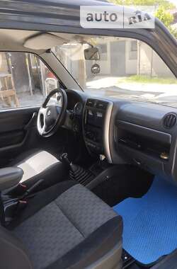 Внедорожник / Кроссовер Suzuki Jimny 2009 в 