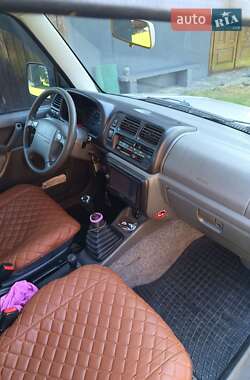 Внедорожник / Кроссовер Suzuki Jimny 1999 в Славском