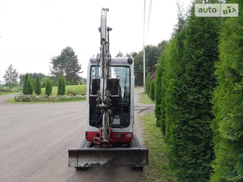Евакуатор Takeuchi TB 2010 в Сарнах