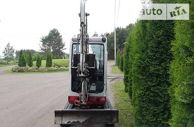 Эвакуатор Takeuchi TB 2010 в 