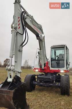 Колесный экскаватор Takeuchi TB 2008 в 