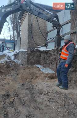 Колесный экскаватор Terex TW 2009 в 