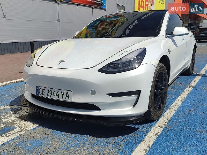 2018 Tesla Model 3, VIN 5YJ3E1EBXJF098018:plate — фото 1 (autoria)