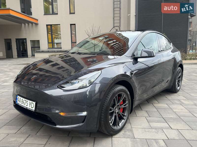 2024 Tesla Model Y, VIN 7SAYGDEE4RA316722:plate — фото 1 (autoria)