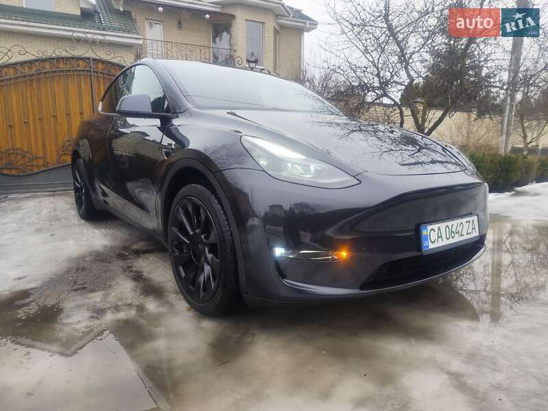 2024 Tesla Model Y, VIN 7SAYGDEE6RF074728:plate — фото 1 (autoria)