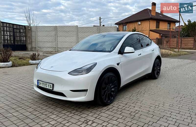 2023 Tesla Model Y, VIN 7SAYGDEF2PF833705:plate — фото 1 (autoria)