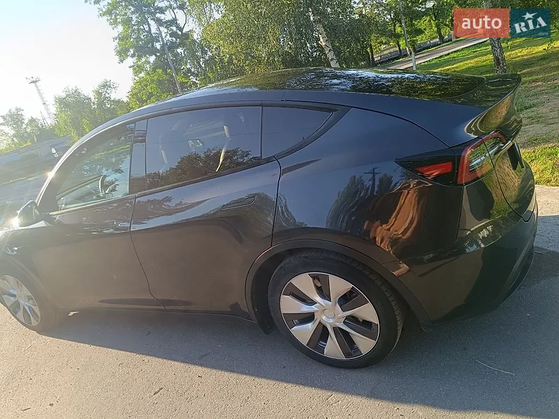 Tesla Model Y 2024 VIN 7SAYGDED1RF053597 фото оголошення 5 з 66
