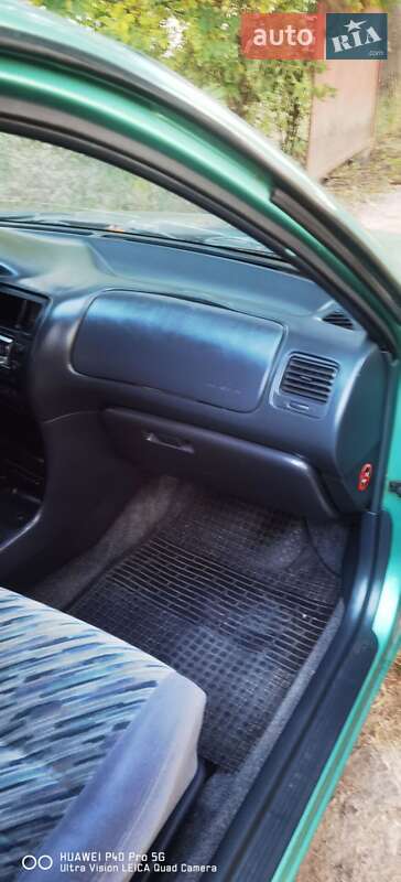 Хетчбек Toyota Corolla 1997 в Турбовом фото 11 Хетчбек Toyota Corolla 1997 в Турбовом