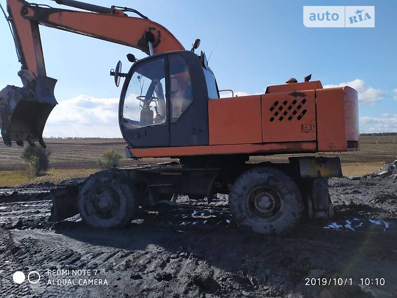 Экскаватор погрузчик ТВЭКС ЕК-18 2006 в 