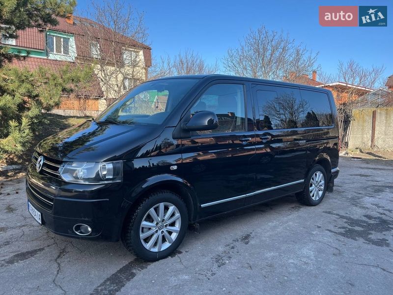 2011 Volkswagen Multivan, VIN WV2ZZZ7HZBH129848:plate — фото 1 (autoria)