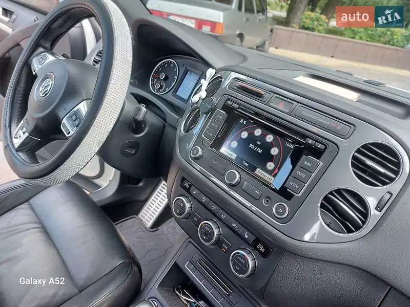 Volkswagen Tiguan 2013 VIN WVGAV3AX1EW038579 фото оголошення 11 з 73