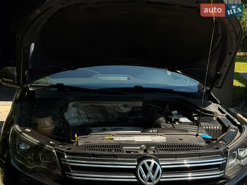 Volkswagen Tiguan 2013 VIN WVGBV3AX9EW541104 фото оголошення 12 з 77
