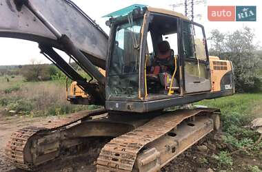 Экскаватор погрузчик Volvo EC 290B LC 2010 в 