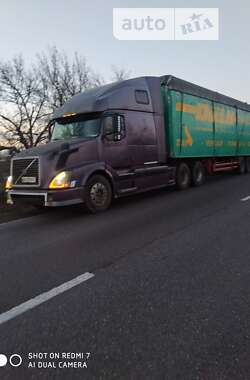 Тягач Volvo VNL 670 2003 в 
