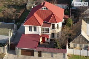 Продается дом на 2 этажа 260 кв. м с участком