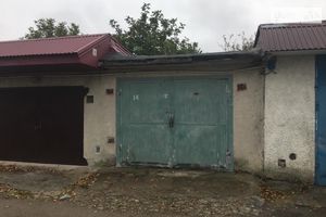 Продается место в гаражном кооперативе под легковое авто на 18 кв. м